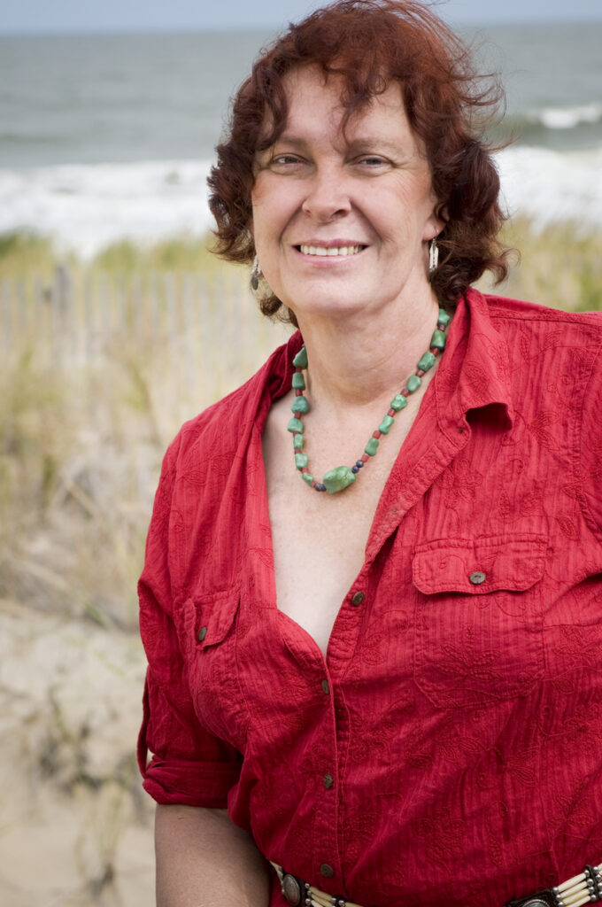 Transgender female on windy beach